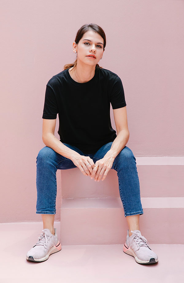 woman casual black shirt sitting steps